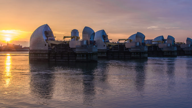 London's flood barrier on river Thames and Canary Wharf