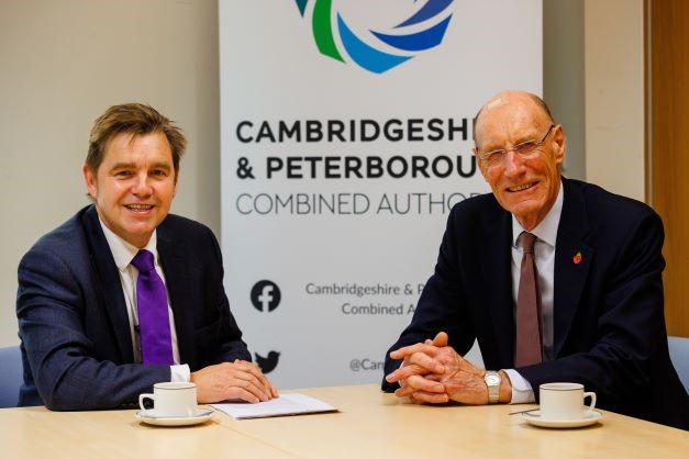 Mayor of Cambridge and Peterborough, Dr Nik Johnson, shown seated (left) with Commission Chair Sir John Armitt