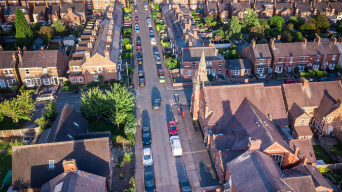 View of streets and houses British residential area from the air.