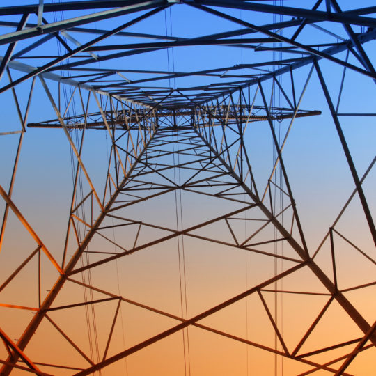 An electricity pylon viewed from underneath