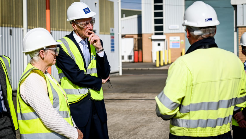 Commissioners in high vis clothing visiting an infrastructure site