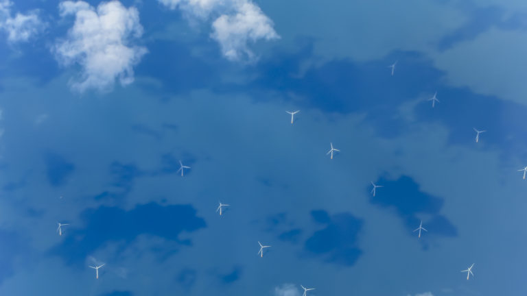 An offshore windfarm viewed from the air