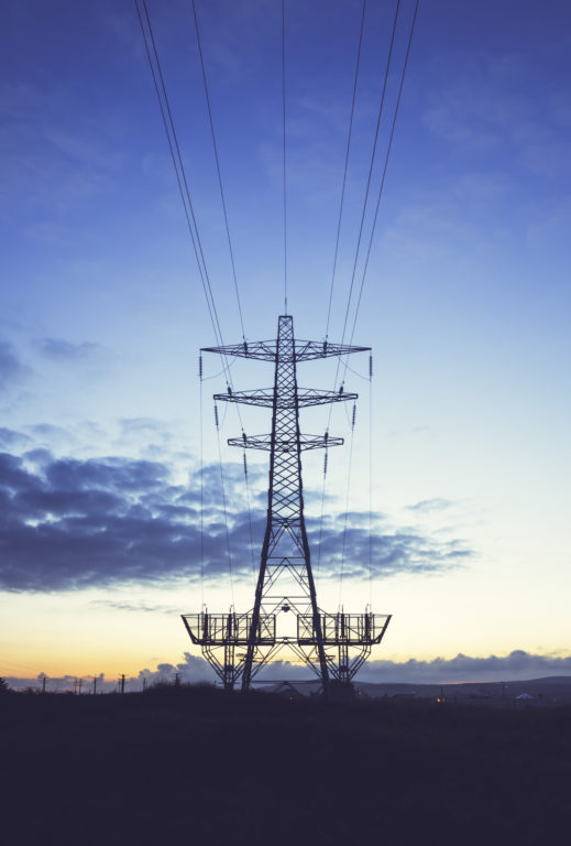 An electricity pylon at dusk