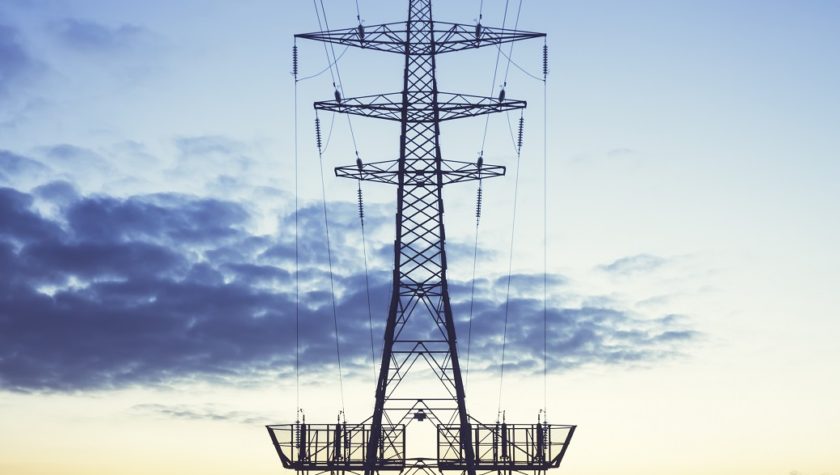 Electricity pylon against the evening sky