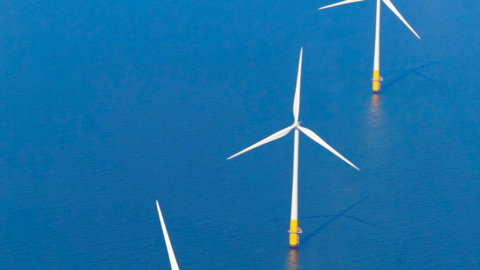 Aerial view of an offshore wind turbine